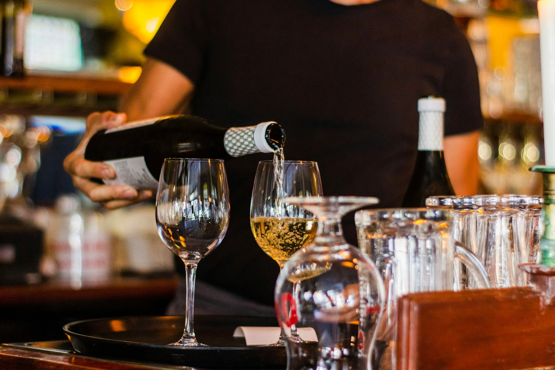 Wine poured at the bar